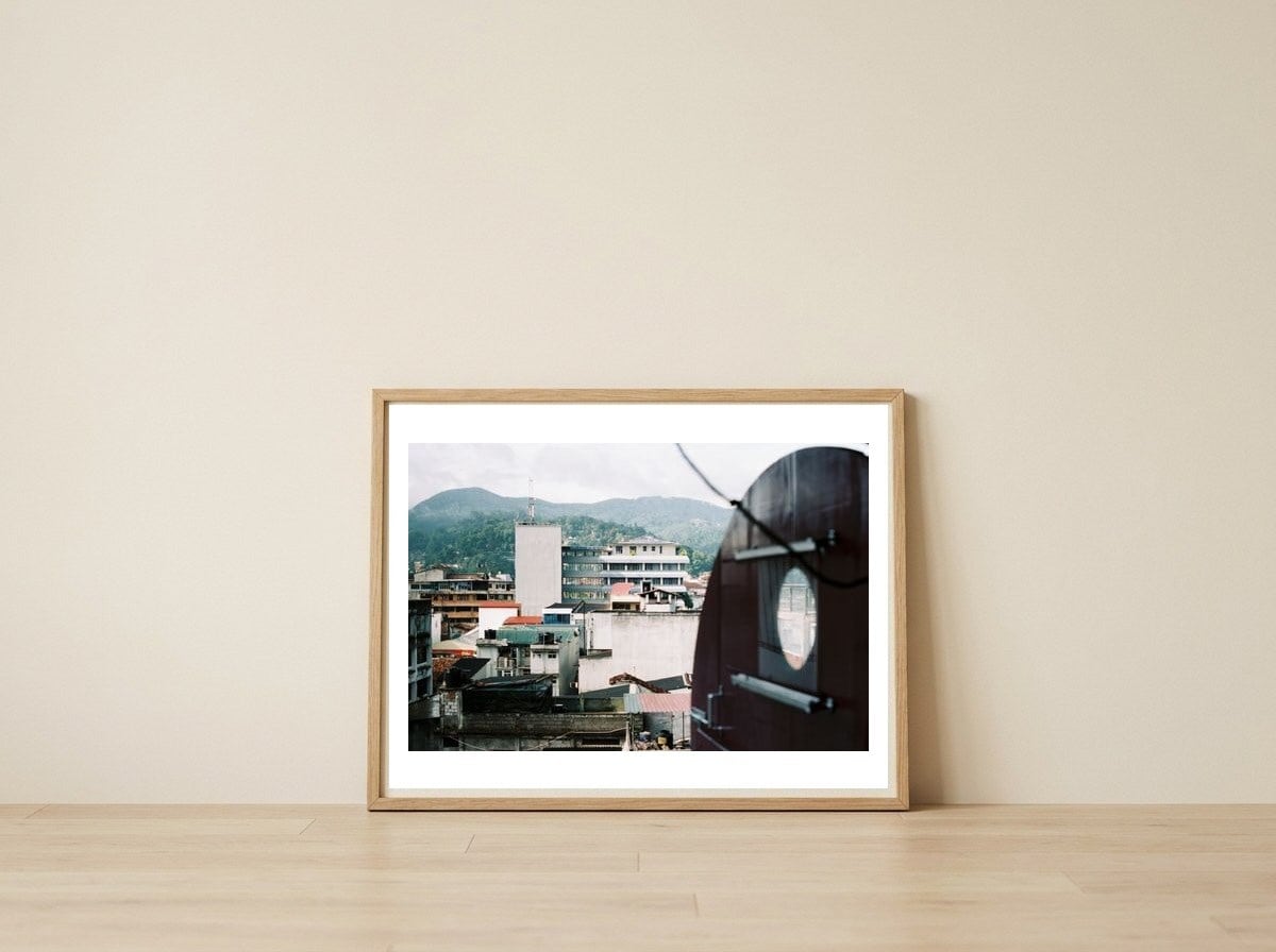 KANDY — framed, leaning against the wall