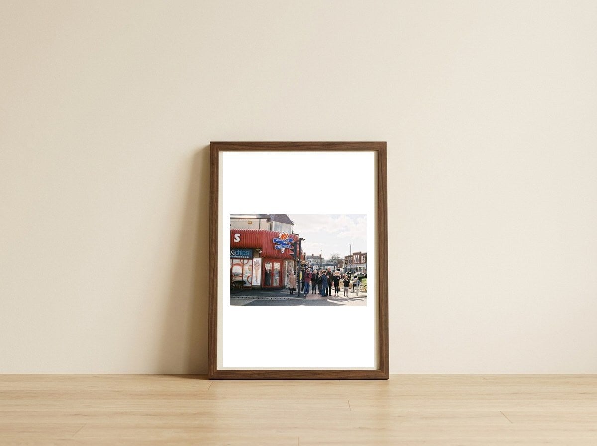 WHITLEY BAY — framed, leaning against the wall