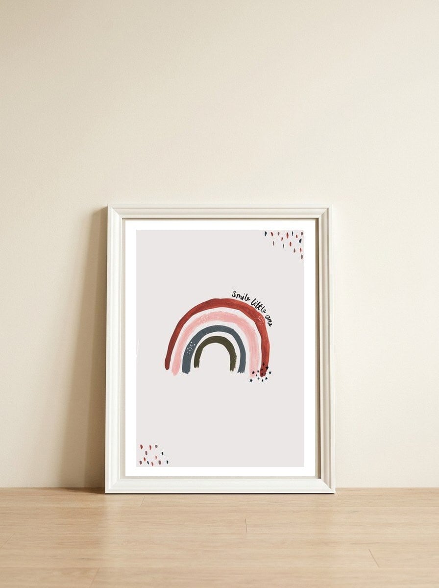Smile Little One Rainbow Portrait — framed, leaning against the wall