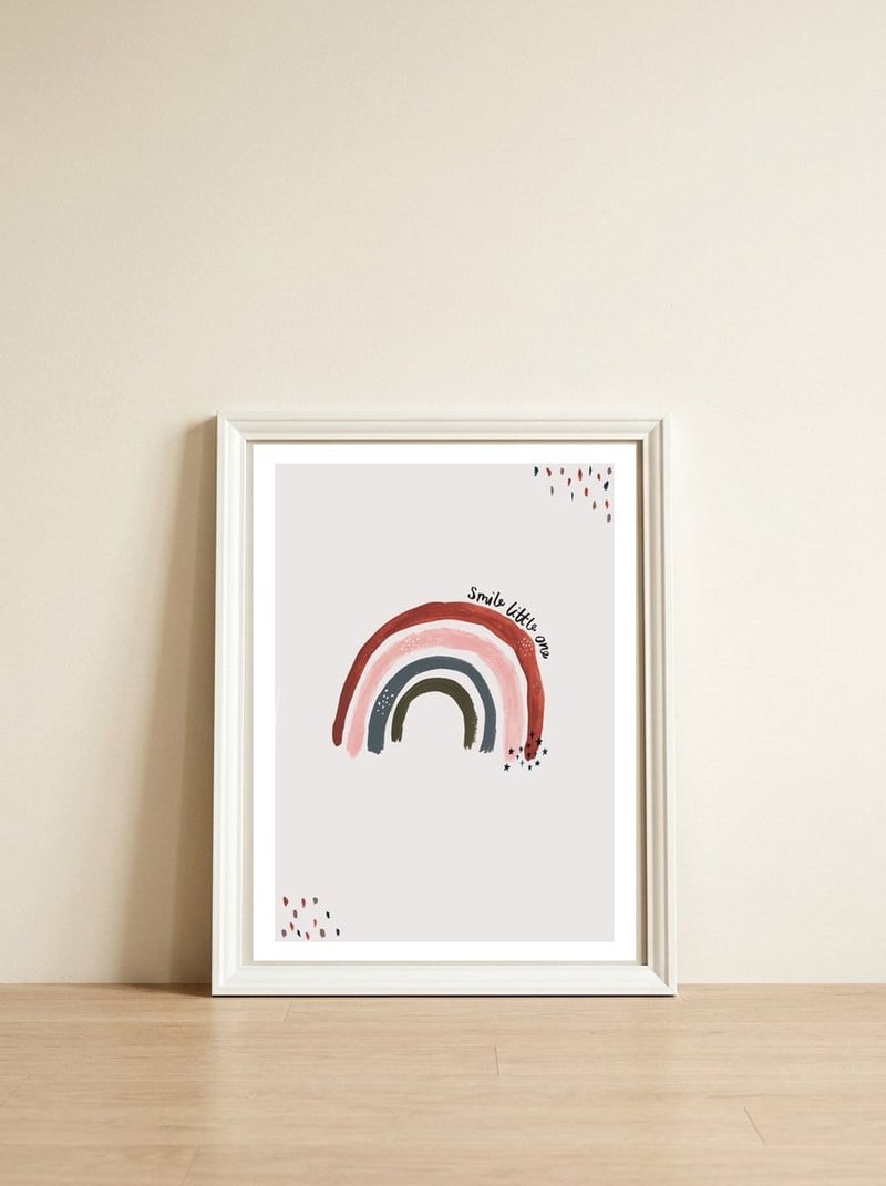 Smile Little One Rainbow Portrait — framed, leaning against the wall