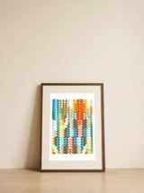 Geometric Triangles Sunset — framed, leaning against the wall thumbnail