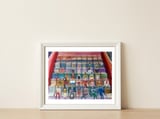 En El Cine — framed, leaning against the wall thumbnail