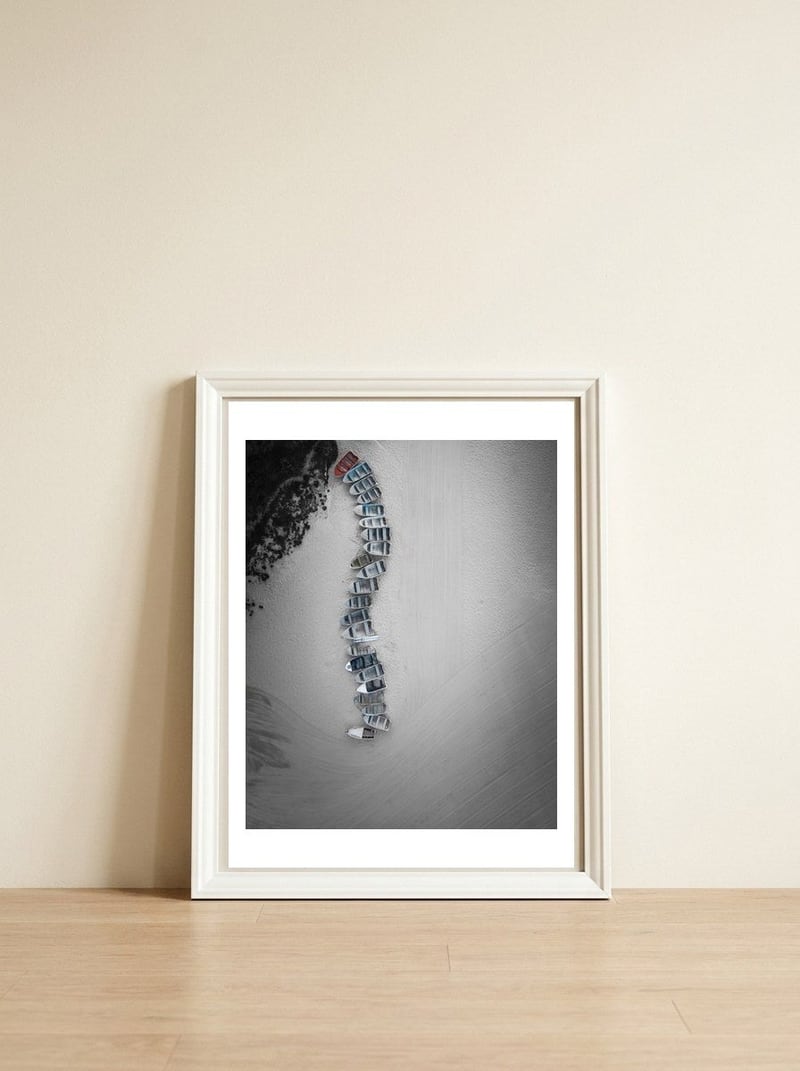Waiting for launch... — framed, leaning against the wall