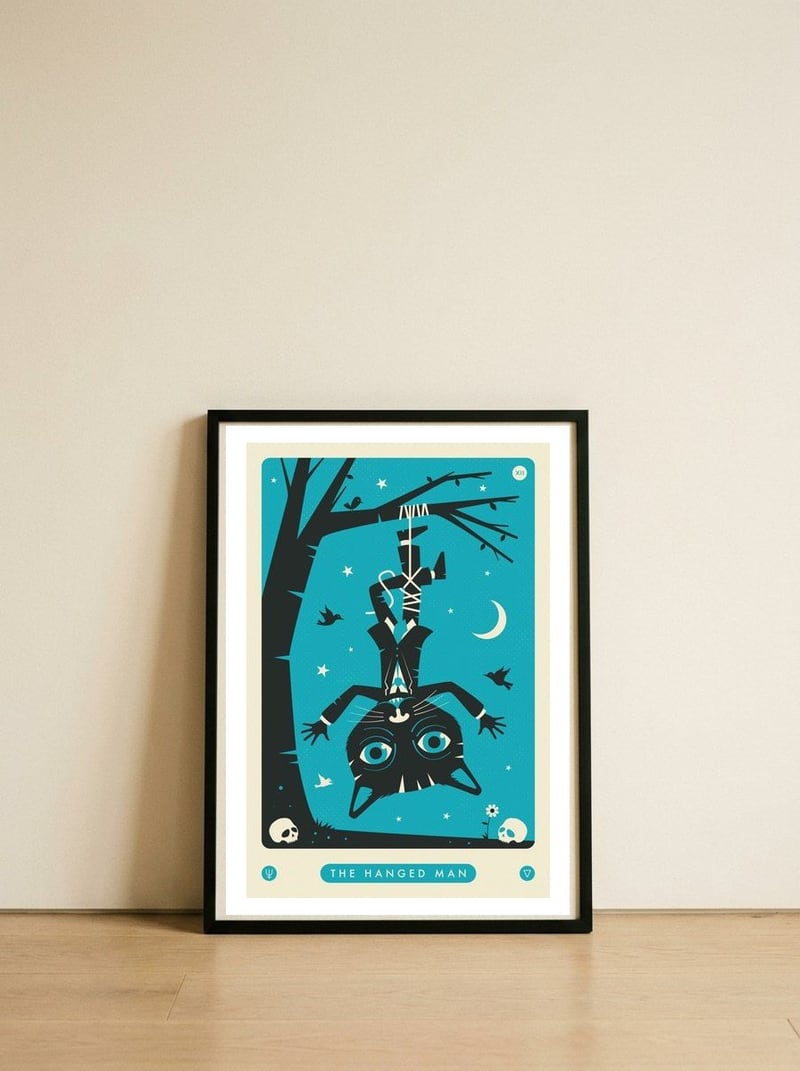TAROT CARD CAT: THE HANGED MAN — framed, leaning against the wall