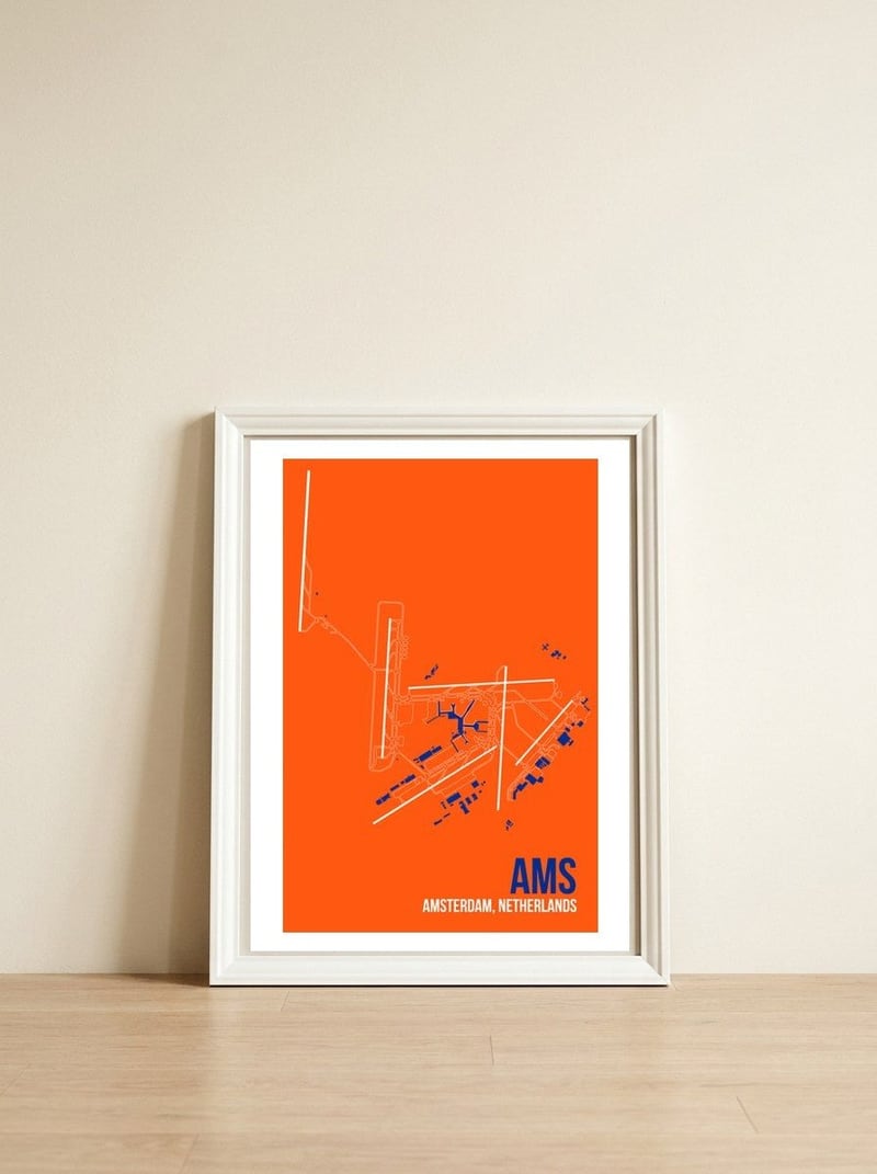 Amsterdam Airport Layout — framed, leaning against the wall