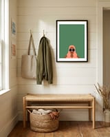 Lady with pink hair framed in a relaxed room thumbnail