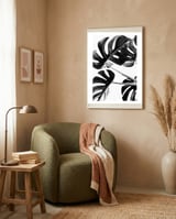 Monstera Black And White 05 framed in a tender room thumbnail