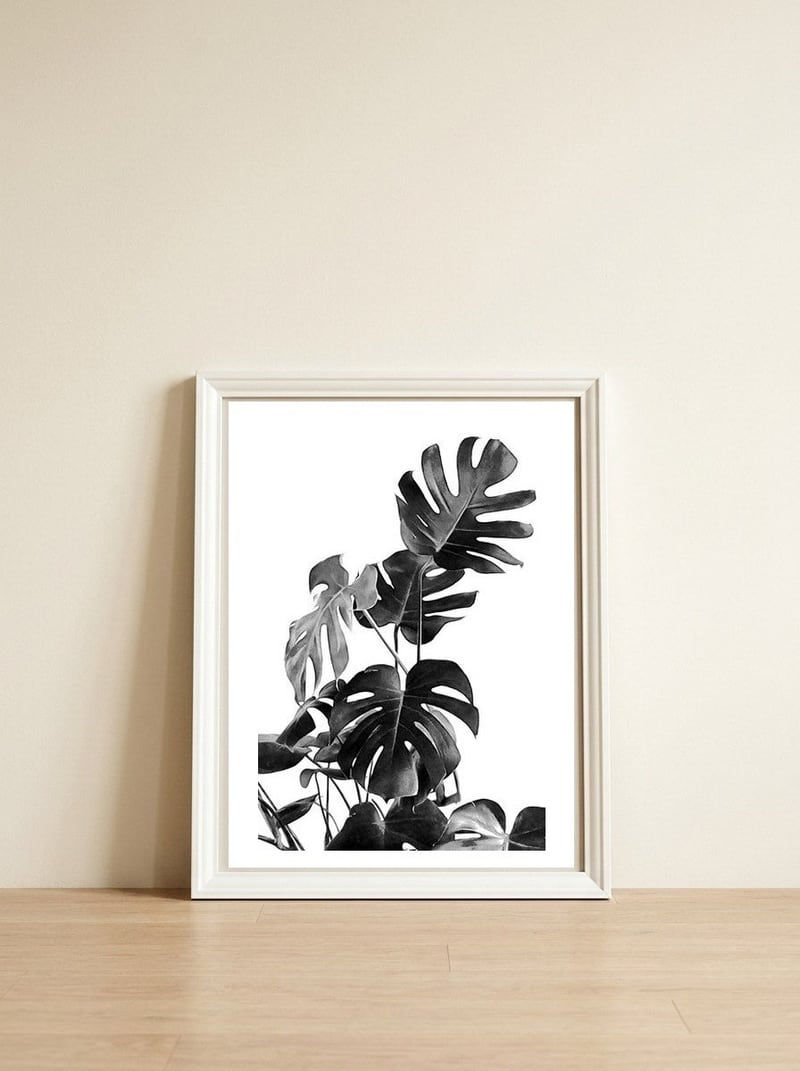 Monstera Black And White 09 — framed, leaning against the wall