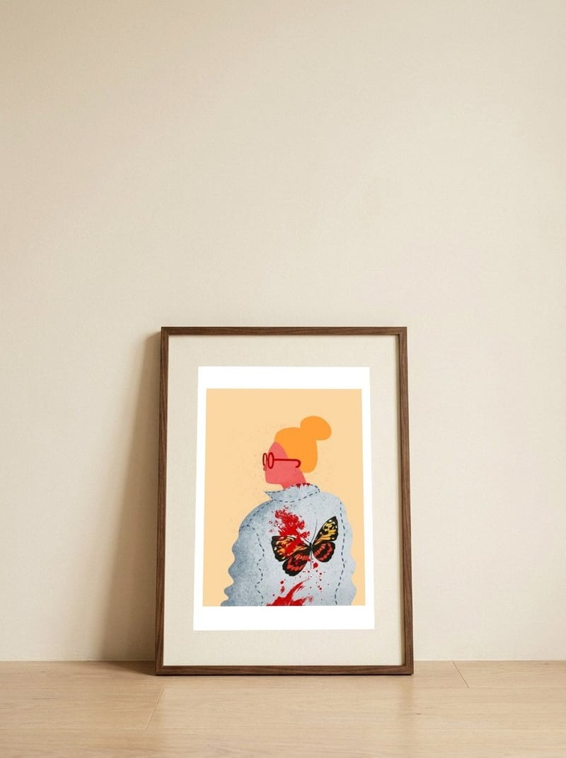 Lady in red glasses — framed, leaning against the wall