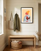 Lady in red glasses framed in a relaxed room thumbnail