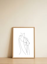 female chest line  — framed, leaning against the wall thumbnail