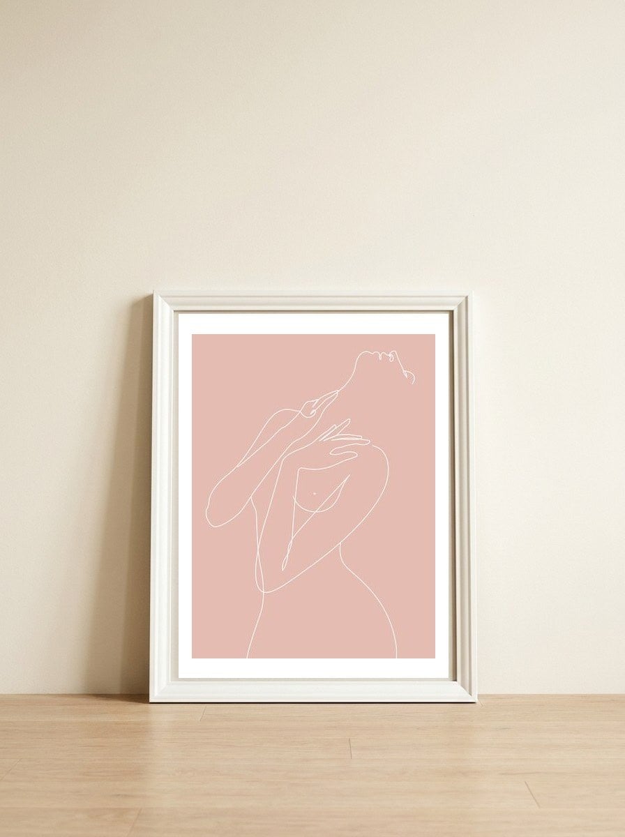 wake woman line-pink — framed, leaning against the wall