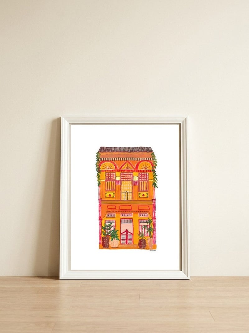 Orange House A4 — framed, leaning against the wall