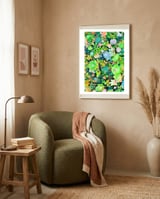 The Desert Works Constantly To Forbid It, But The Cactus Blooms Anyway framed in a tender room thumbnail