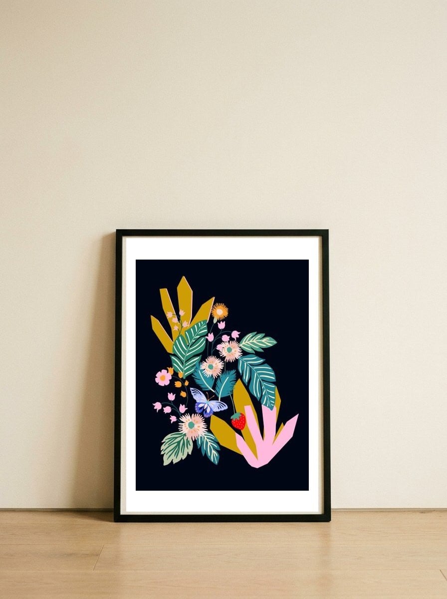 Flowers and leaves — framed, leaning against the wall