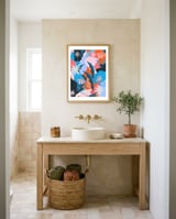 Blue, orange and pink framed in a breezy room thumbnail