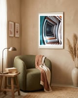 spiral stairs framed in a tender room thumbnail
