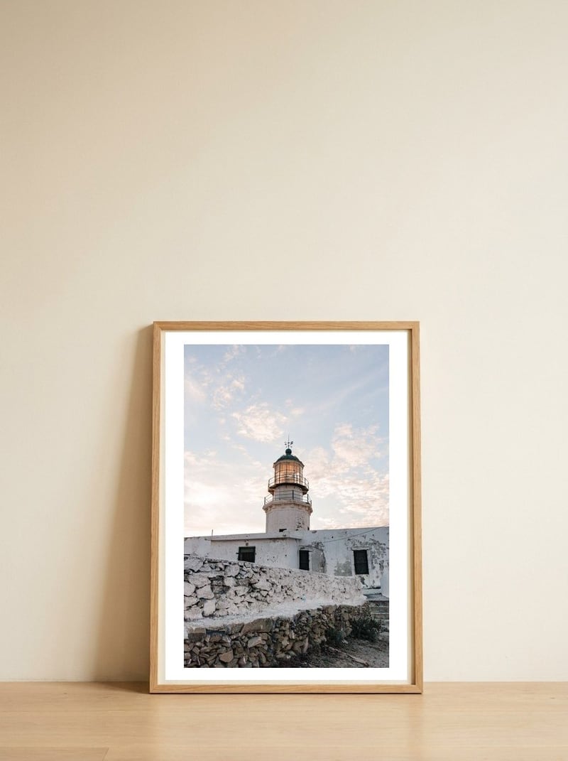 Armenistis Lighthouse Portrait — framed, leaning against the wall