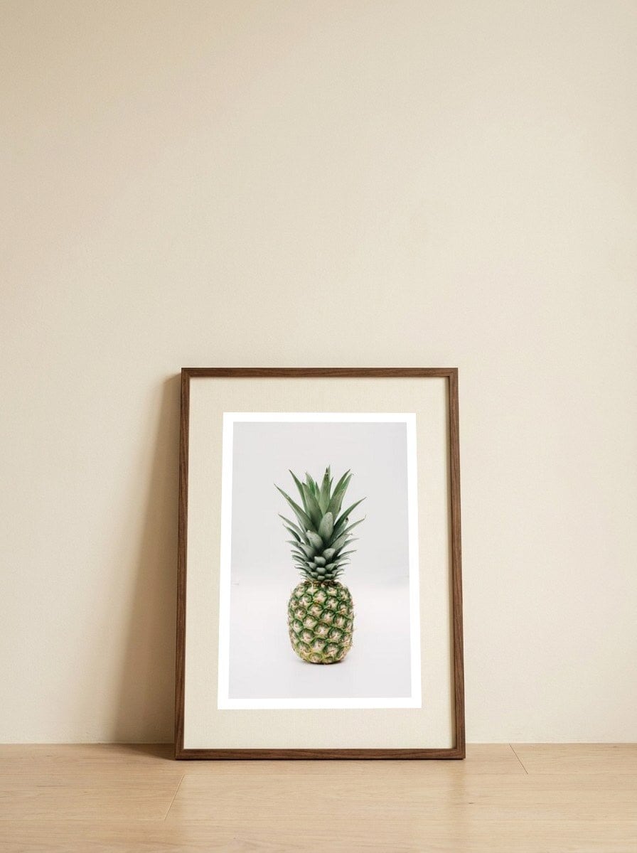 Pineapple — framed, leaning against the wall