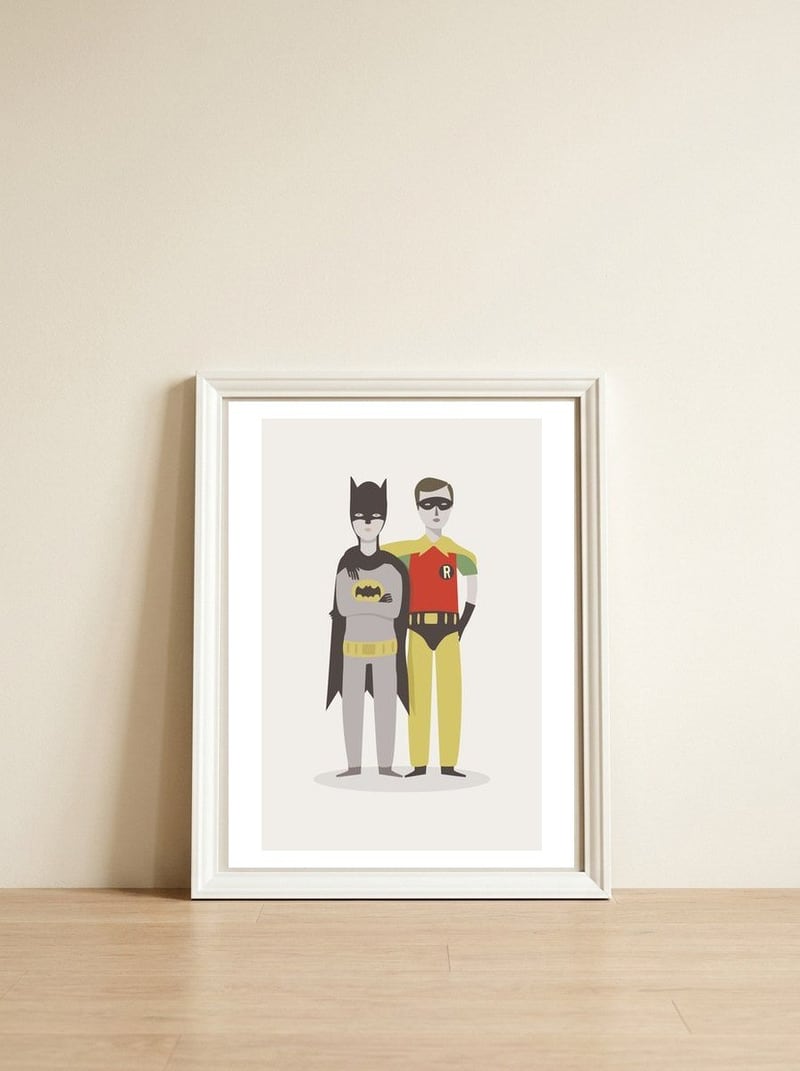 Superheroes — framed, leaning against the wall