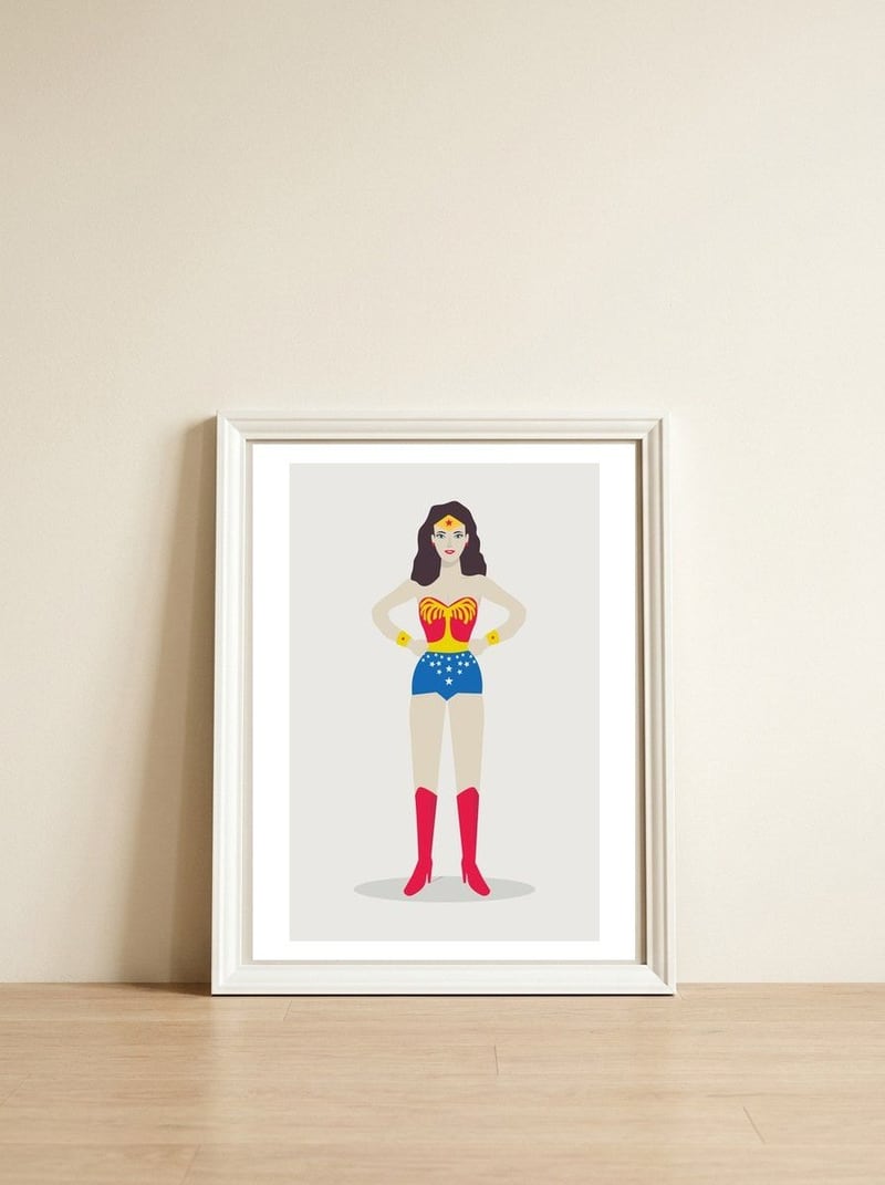 Superheroine — framed, leaning against the wall