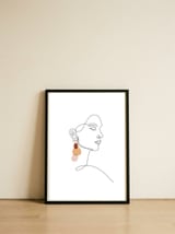 Earring woman — framed, leaning against the wall thumbnail