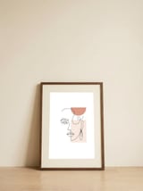 minimal woman face line art — framed, leaning against the wall thumbnail