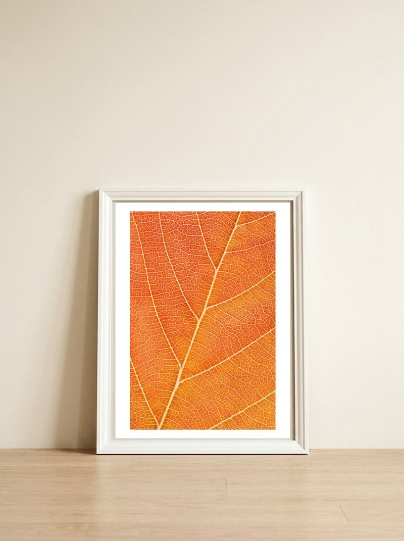 Autumn Leaf — framed, leaning against the wall
