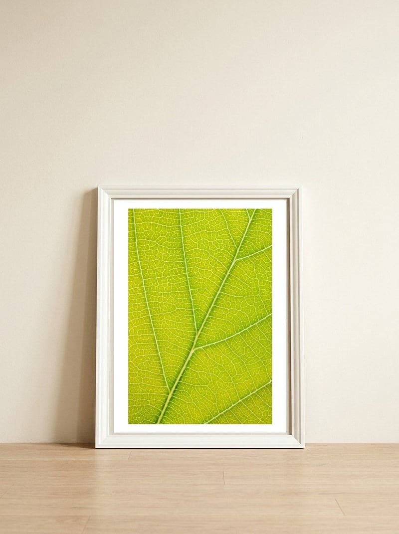 Autumn Leaf — framed, leaning against the wall