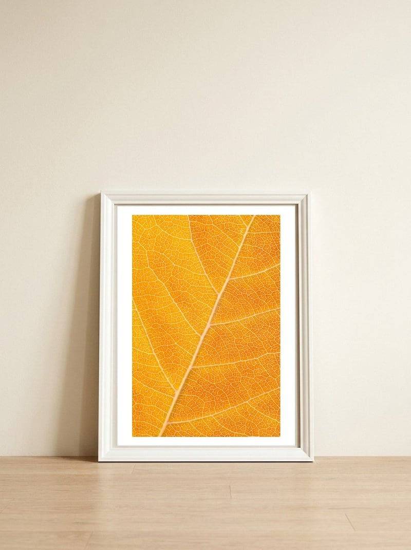Autumn Leaf — framed, leaning against the wall