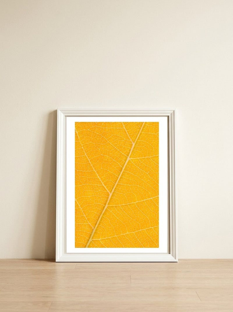 Autumn Leaf — framed, leaning against the wall