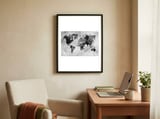 black and white world map framed in a focused room thumbnail