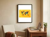 world map yellow art framed in a focused room thumbnail