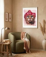 Pinup Cat framed in a tender room thumbnail