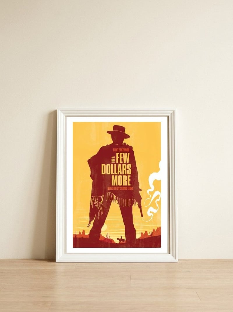 For a few dollars more movie poster — framed, leaning against the wall