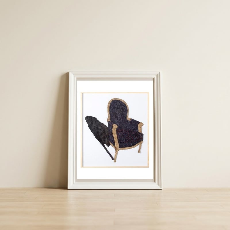 La Partida — framed, leaning against the wall