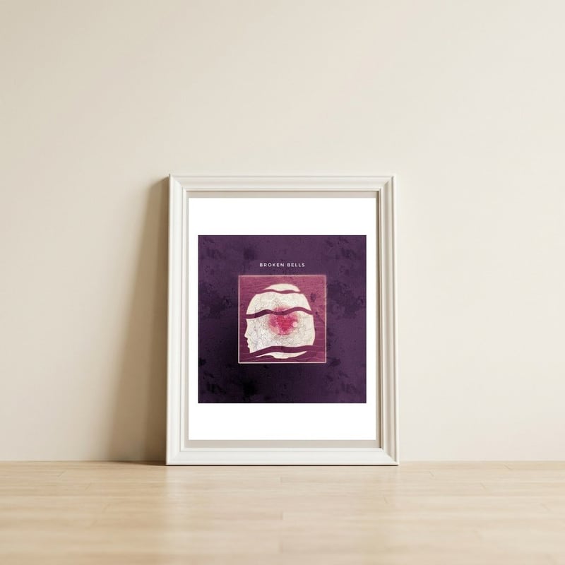Reimagined album  — framed, leaning against the wall