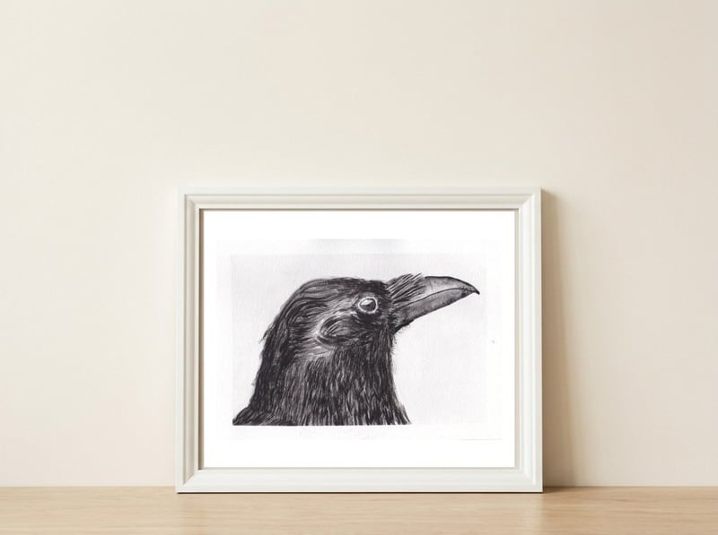 Crow — framed, leaning against the wall