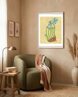 Blue Flowers framed in a tender room thumbnail