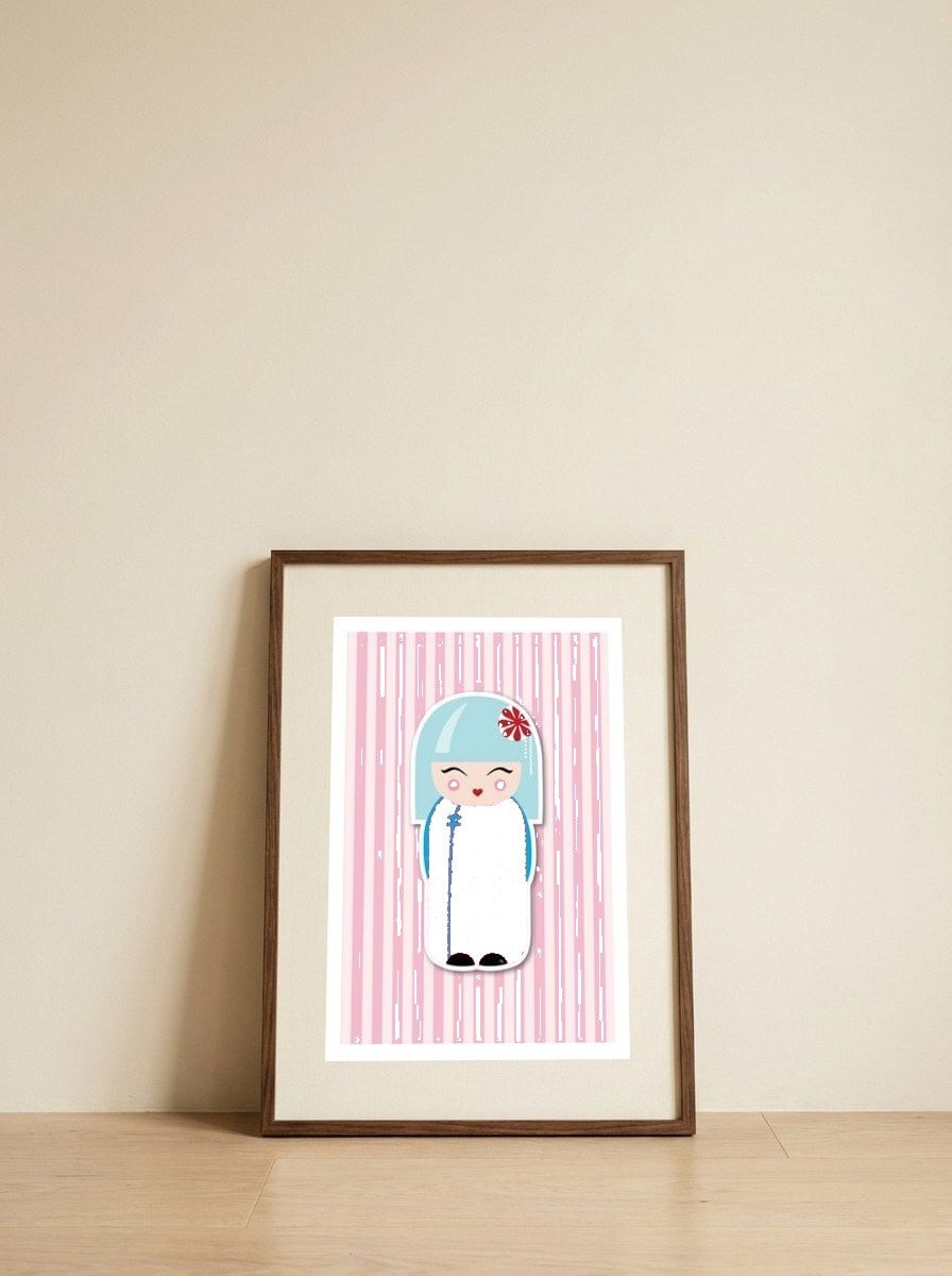 Kokeshi — framed, leaning against the wall