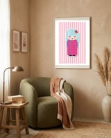 Kokeshi framed in a tender room thumbnail