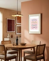 Pink Glasses framed in a intimate room thumbnail