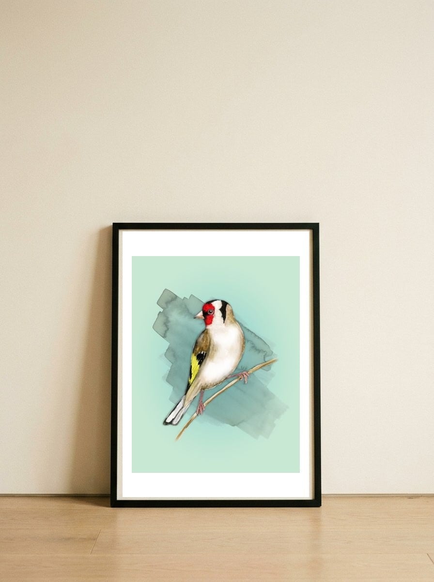  Goldfinch watercolor — framed, leaning against the wall
