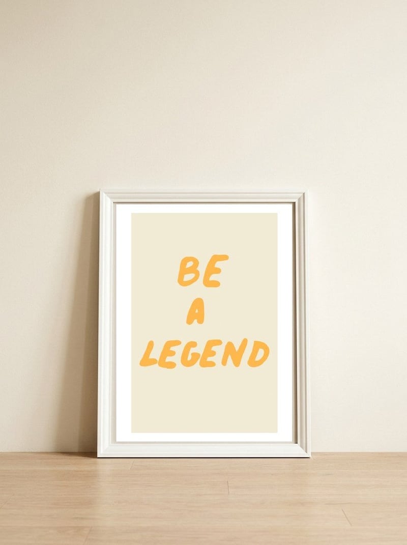 Be a Legend — framed, leaning against the wall