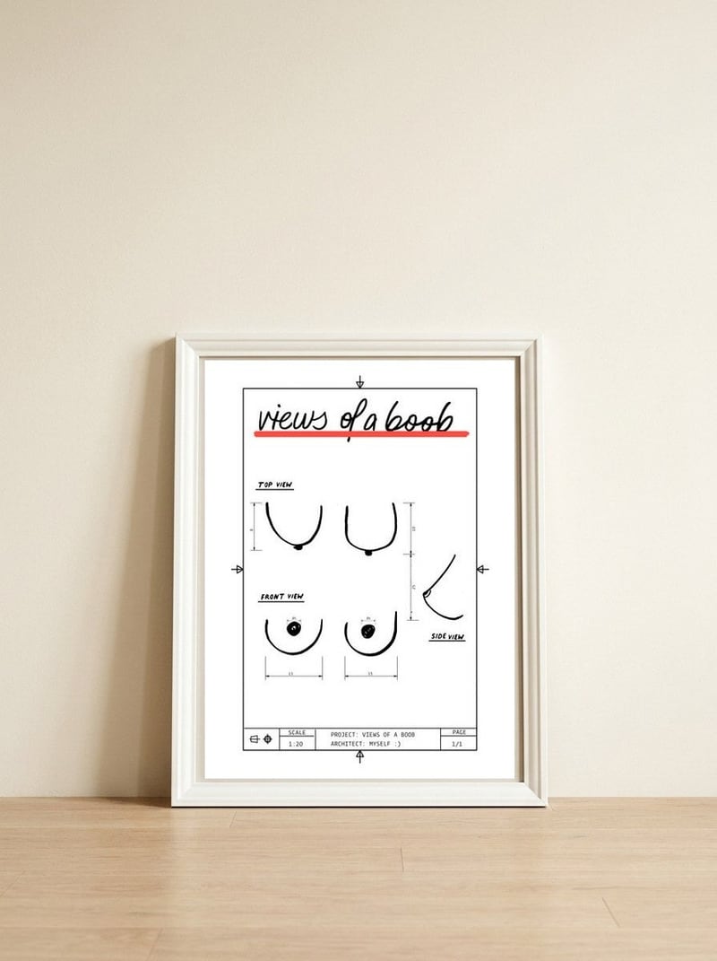 Views of a boob — framed, leaning against the wall
