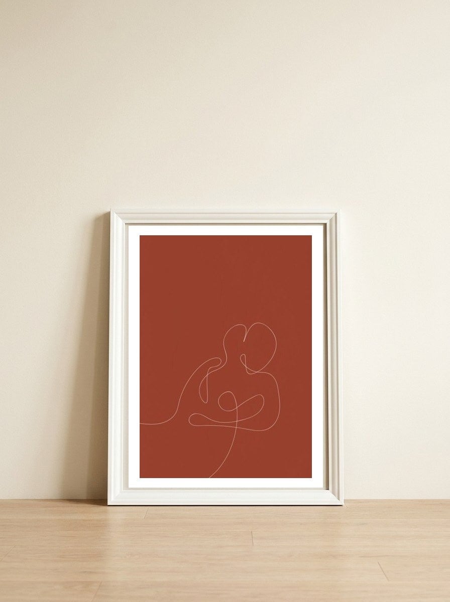 Female Line Art — framed, leaning against the wall