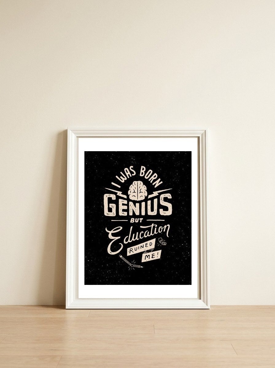 Born Genius — framed, leaning against the wall