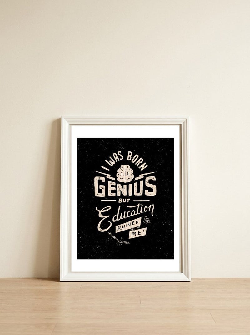 Born Genius — framed, leaning against the wall