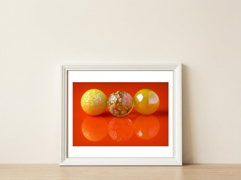 Marbles — framed, leaning against the wall