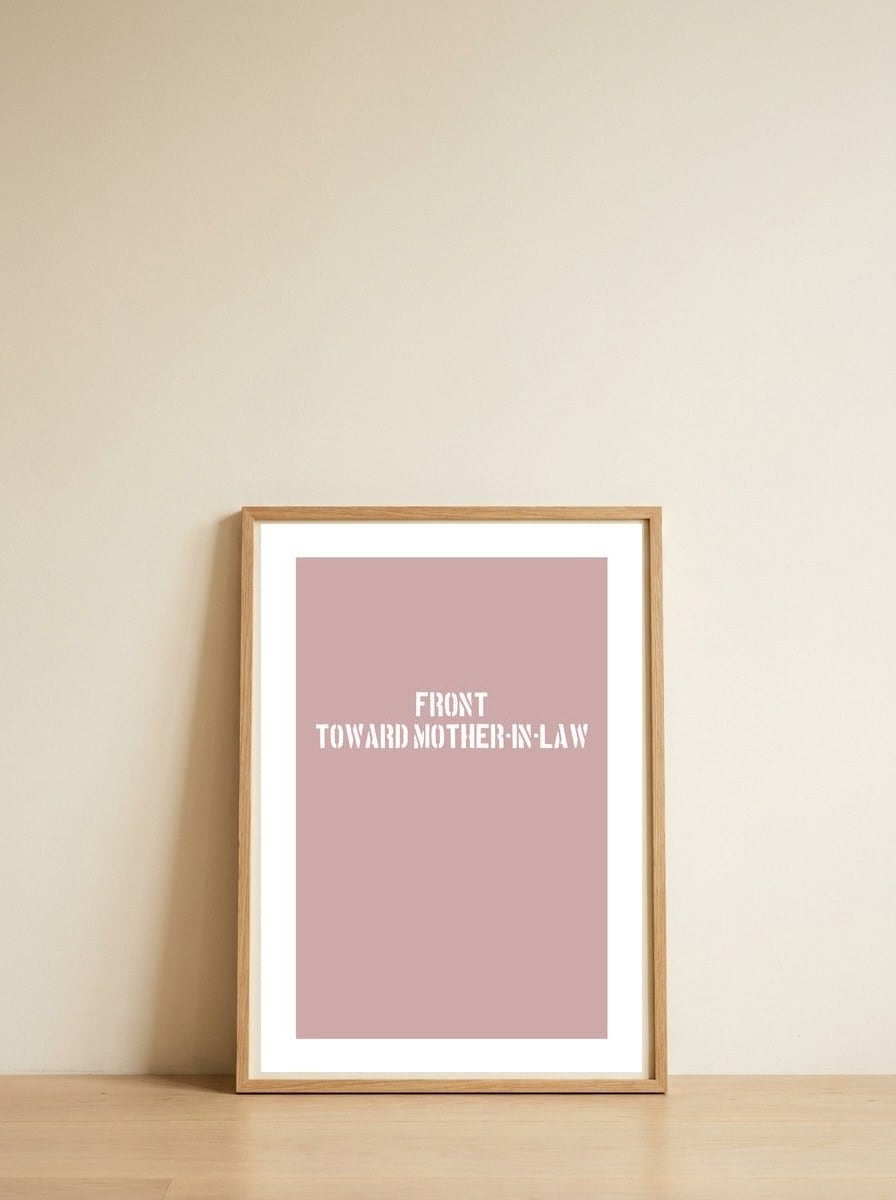 TOWARD MOTHER-IN-LAW — framed, leaning against the wall
